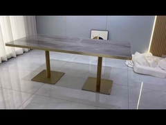 Table à manger en acier inoxydable rose doré restaurant haut de marbre de luxe avec couture dorée